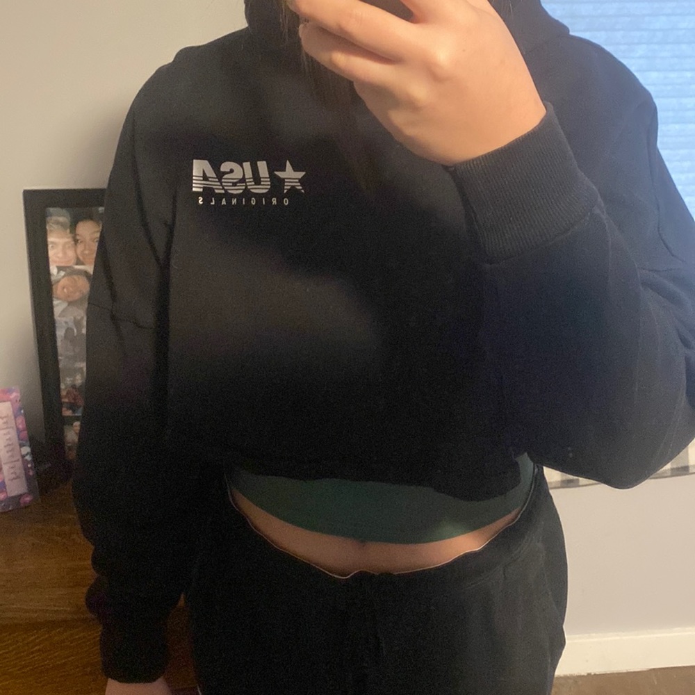 this is a black size large cropped sweatshirt